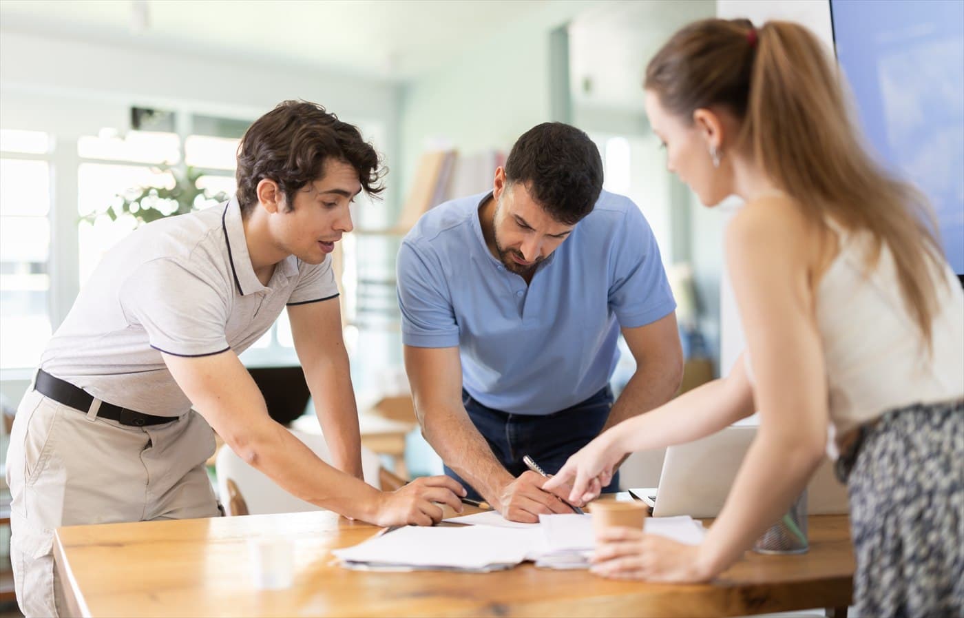 People reviewing important quote documents together